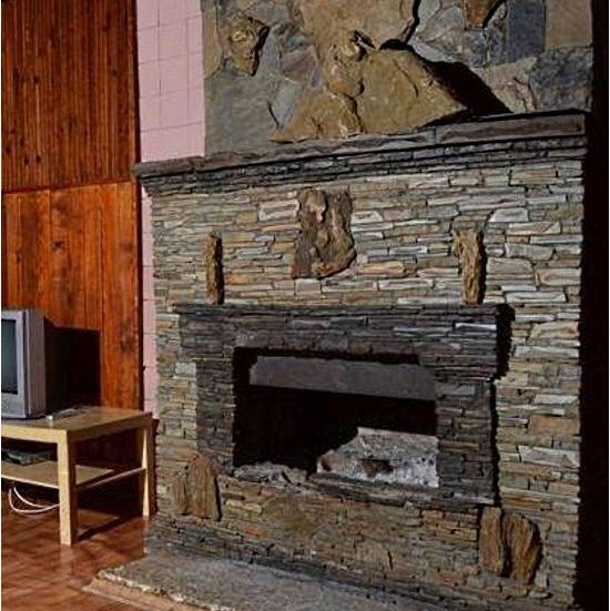 Камины с отделкой из натурального камня