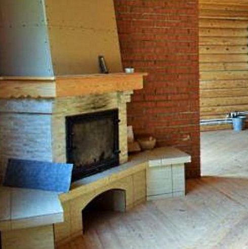 Камины с отделкой из натурального камня