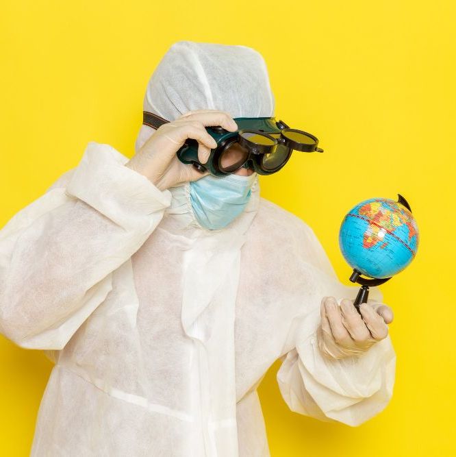 <a href="https://www.freepik.com/free-photo/front-view-male-scientific-worker-special-suit-holding-little-round-globe-yellow-desk_12154563.htm#page=2&