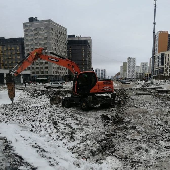 Аренда колёсного экскаватора с гидромолотом в Санкт-Петербурге, аренда колёсного экскаватора с планировочным ковшом, аренда спецтехники, аренда строит