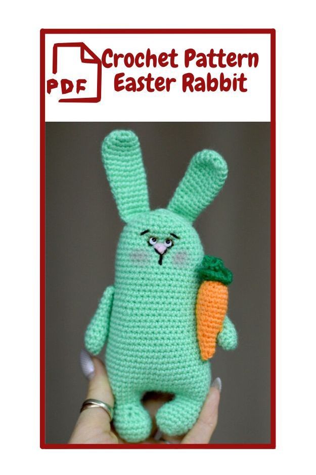 Be My AI: The image shows a crochet pattern for an Easter rabbit. The rabbit is made of light green yarn and has long ears, a simple face with small e